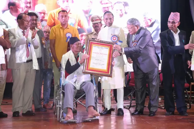 Bikram Bir Thapa receiving Kanchenjunga Rashtriya Sahitya Purashkar